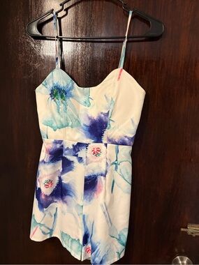 Bundle 3 for $15. May & July Sweetheart Neck Floral Romper in White and Blue.